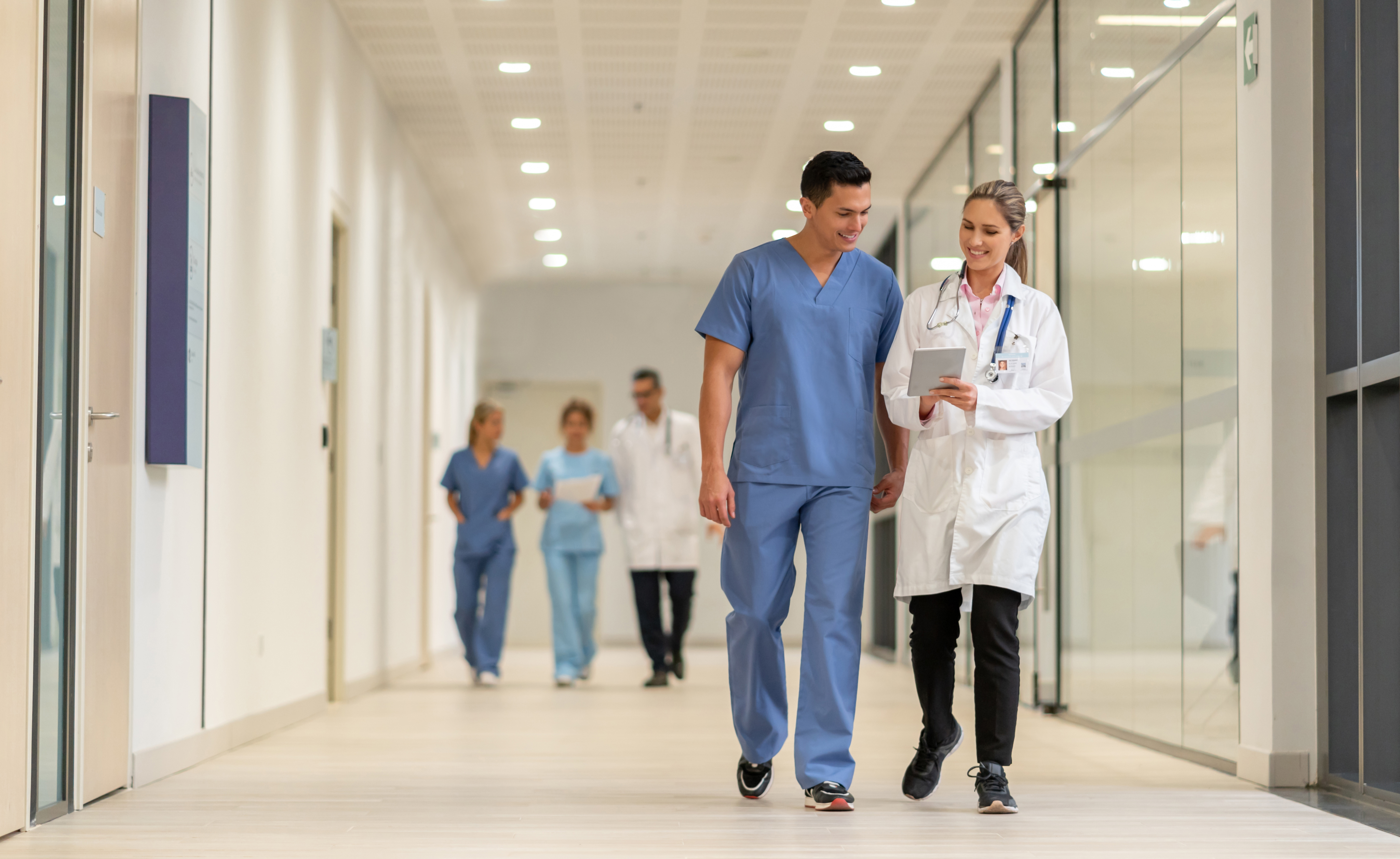 &nbsp;Portrayal of a Capella University online nursing student in a medical facility with a doctor.&nbsp;